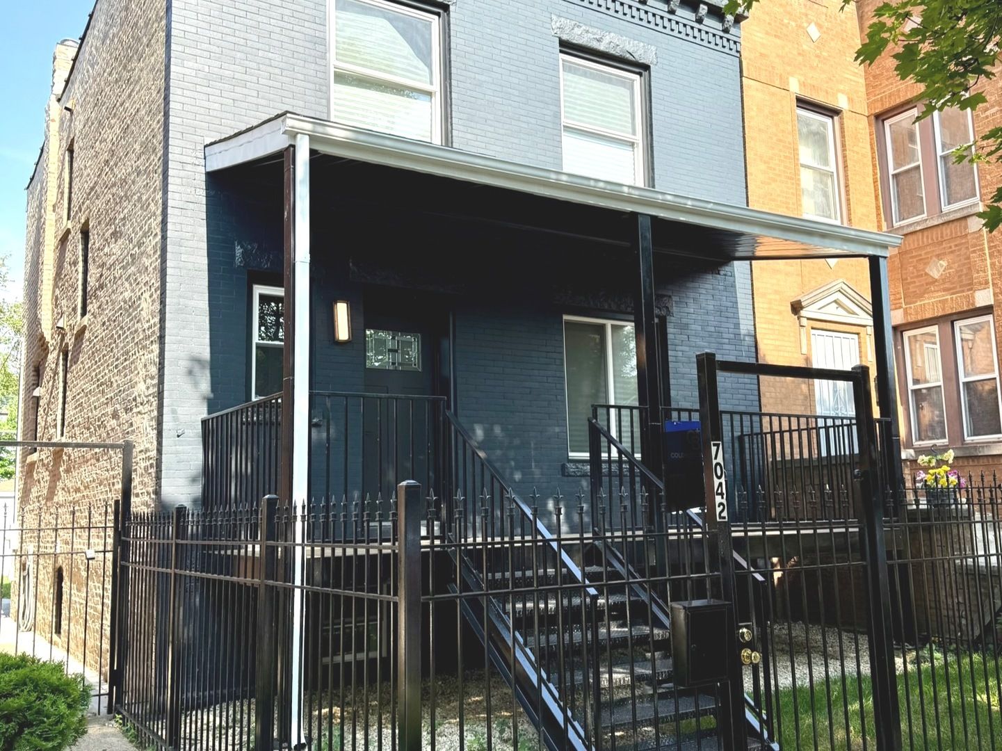 7042 S Eberhart Avenue — Chicago, IL 60637